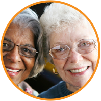 Two smiling senior women